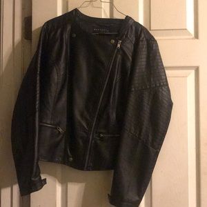 Black jacket size L no tears no rips , like new